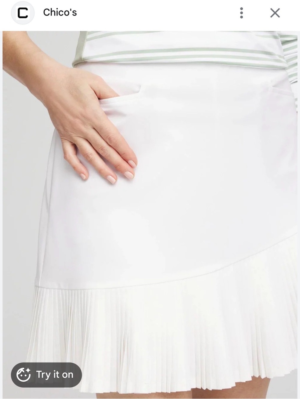 Chico's Zenergy UPF Pleated Skort in the shade Alabaster.